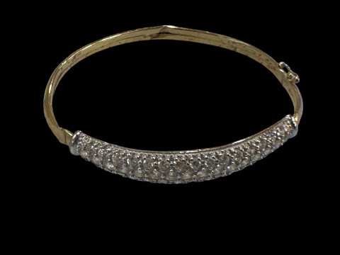 9 carat gold gem set bangle.