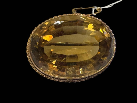 9 carat gold mounted citrine brooch, 3.5cm across.