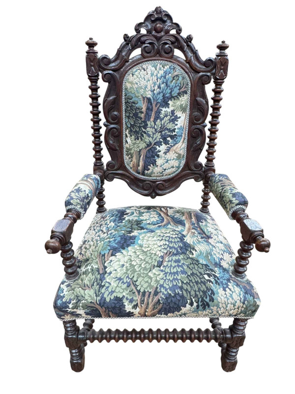 Victorian carved oak bobbin column open armchair in tapestry fabric.