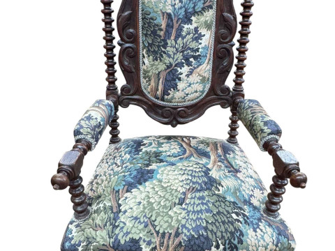 Victorian carved oak bobbin column open armchair in tapestry fabric.