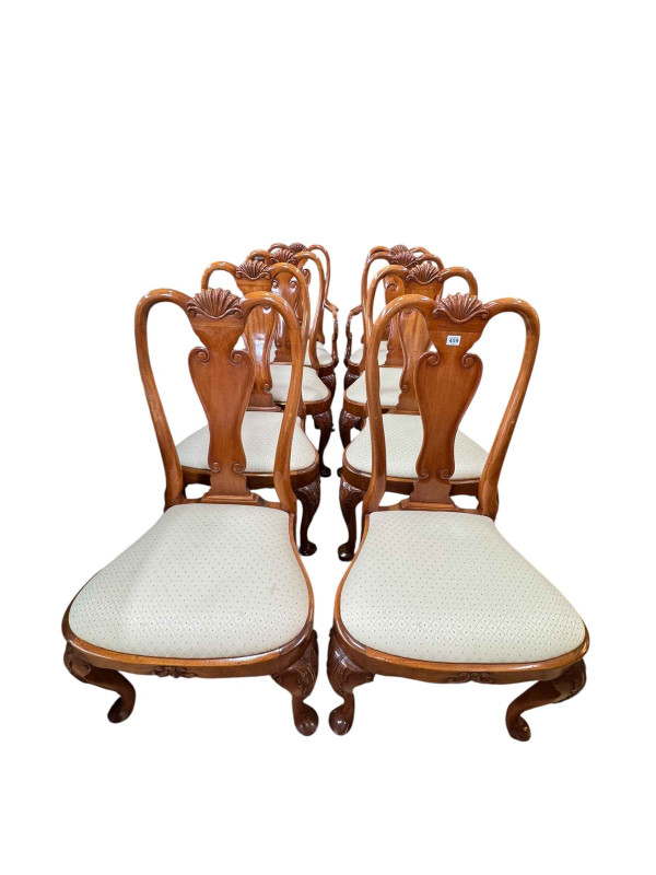Set of eight walnut Queen Anne style dining chairs including pair carvers.