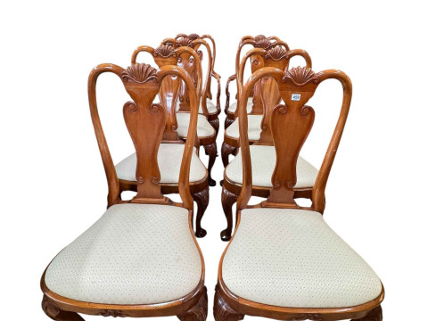 Set of eight walnut Queen Anne style dining chairs including pair carvers.