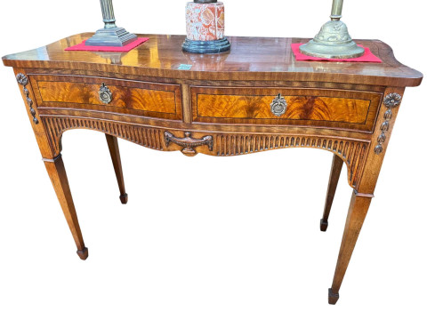 Mahogany and ebony line inlaid two drawer serpentine front side table...