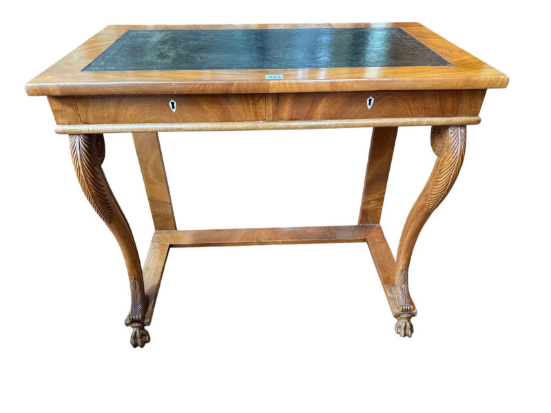 Regency style mahogany two drawer writing table on scrolled front supports to paw feet, 77cm by 87.5cm by 50cm.