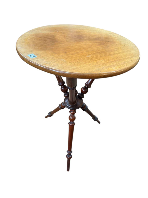 Mahogany gypsy table on turned legs, 73cm by 54cm diameter.