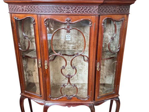Late Victorian/Edwardian mahogany shaped front three door vitrine having...