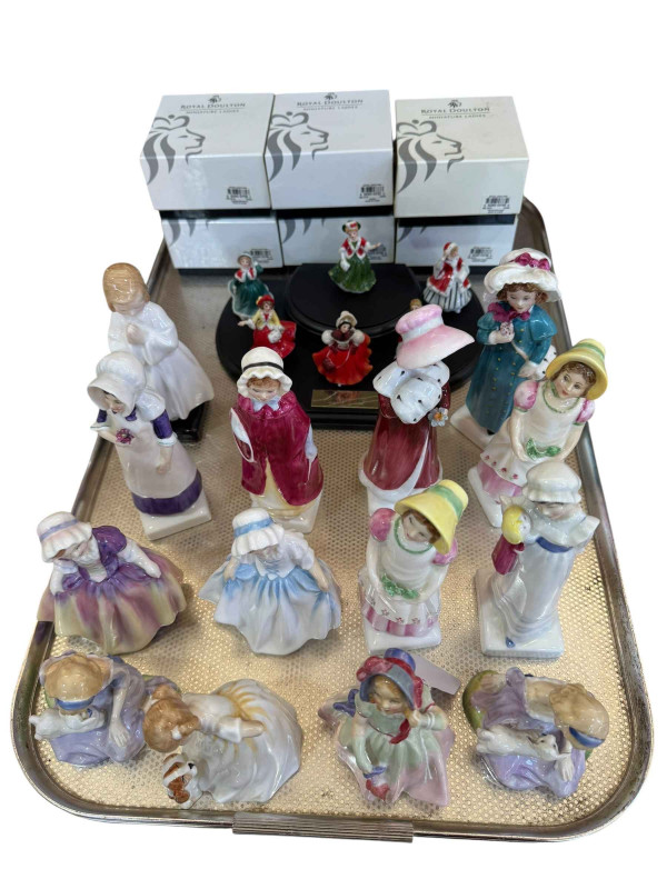 Royal Doulton figures comprising six miniature ladies with boxes and fourteen small Doulton figures including Kate Greenaway.