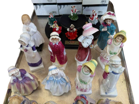 Royal Doulton figures comprising six miniature ladies with boxes and fourteen...
