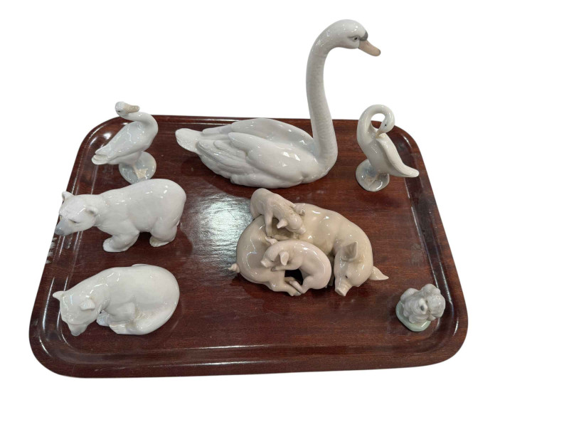 Lladro pig with piglets, two polar bears, three swans and small dog (7).