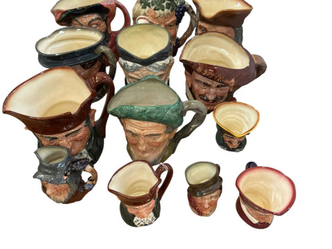 Collection of toby jugs including Royal Doulton Bacchus, Falstaff, Granny,...