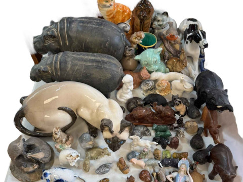 Collection of animal figures including Parian cat, Russian Orangutan,...