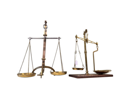 Two balance scales.