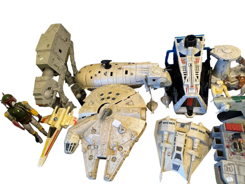 Collection of Star Wars toys and figures.