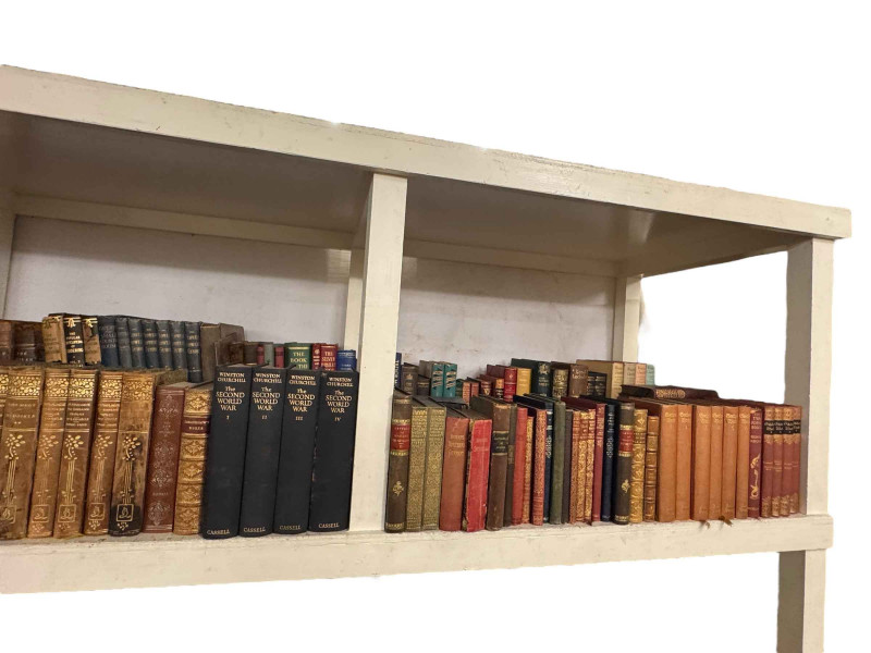 Collection of books including antique leather bound, Winston Churchill, Readers Digest, etc.
