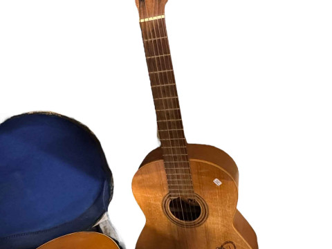 Two guitars and a collection of violins, etc. thumbnail
