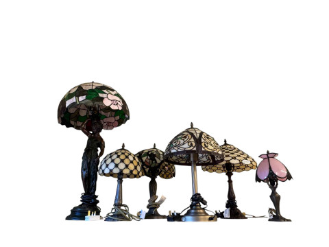 Six Tiffany style table lamps.