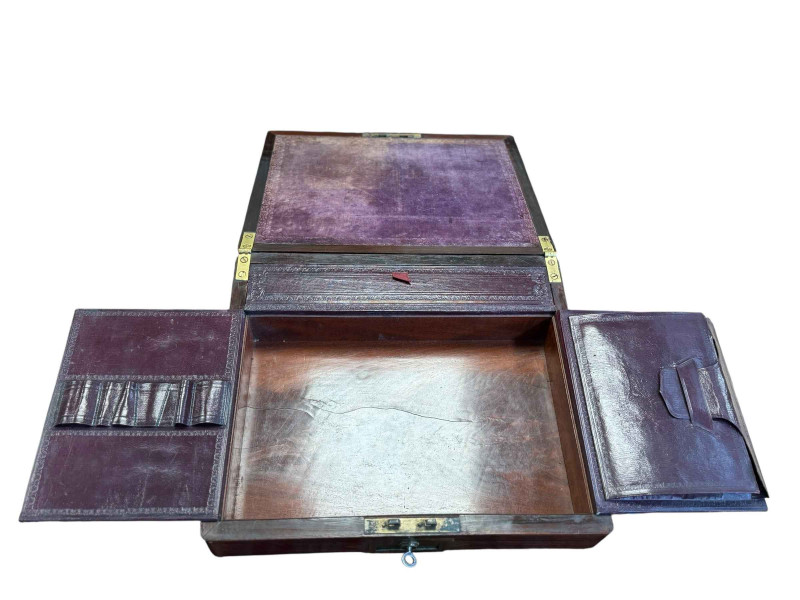 Rosewood inlaid writing slope with compartments.