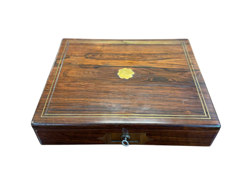 Rosewood inlaid writing slope with compartments.