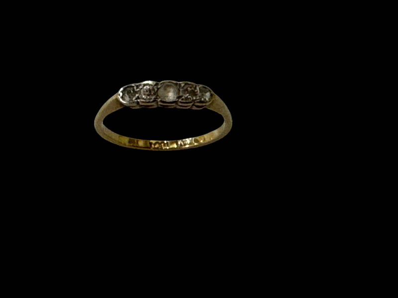 18 carat gold diamond set ring.
