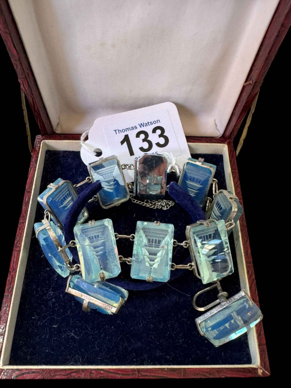 Sterling silver and blue glass bracelet and earring set (one incomplete).