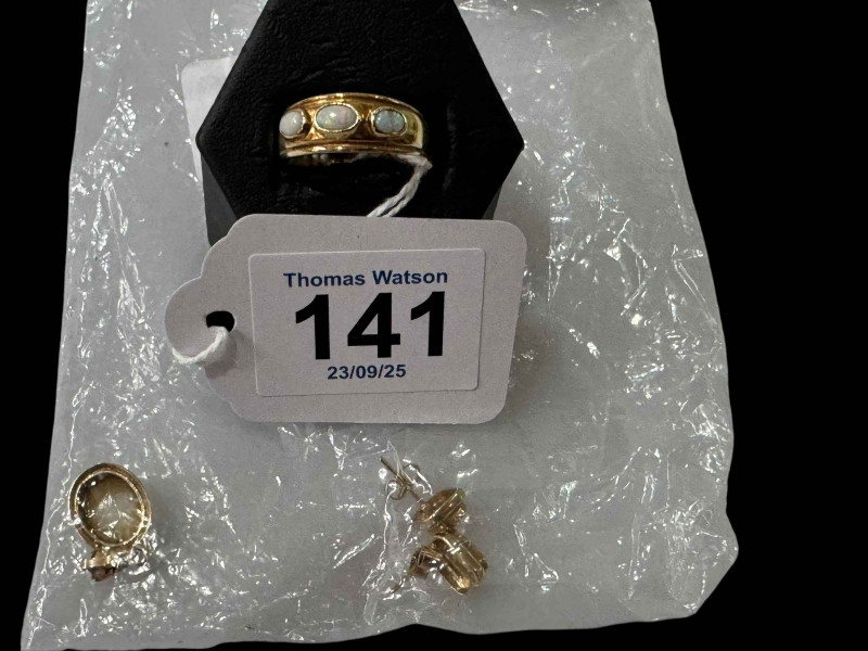 9 carat gold and opal ring, earrings and pendant set.