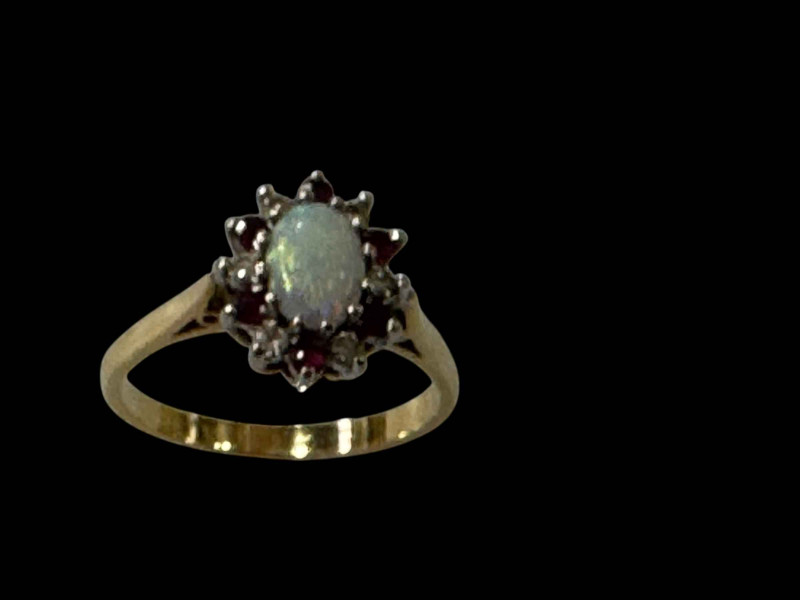 Opal, ruby and diamond cluster 18 carat gold ring, size P.