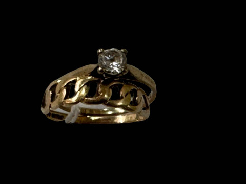 Two 9 carat gold rings, one gem set.