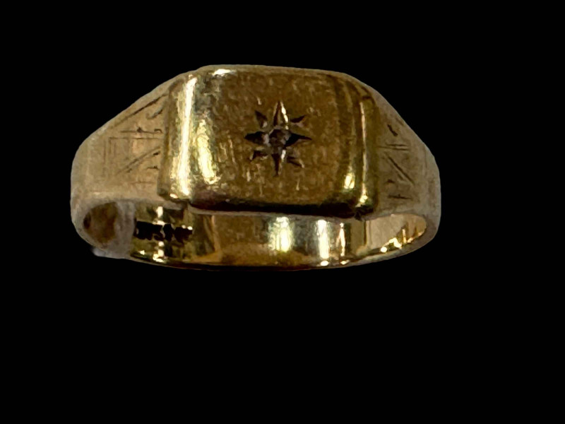Gents 9 carat gold signet ring with tiny diamond.