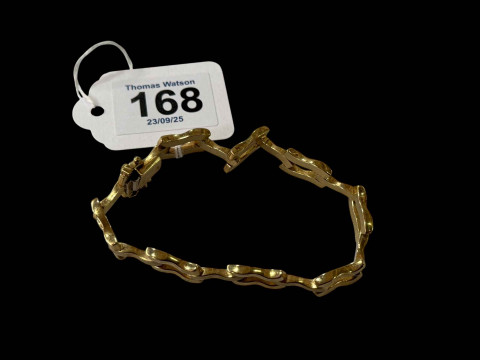 9 carat gold wavy link bracelet.