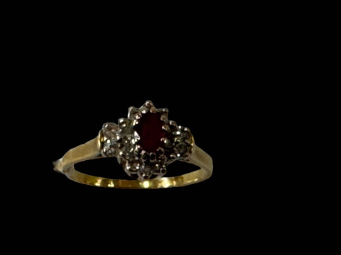 Ruby and diamond 18 carat gold ring, size R.