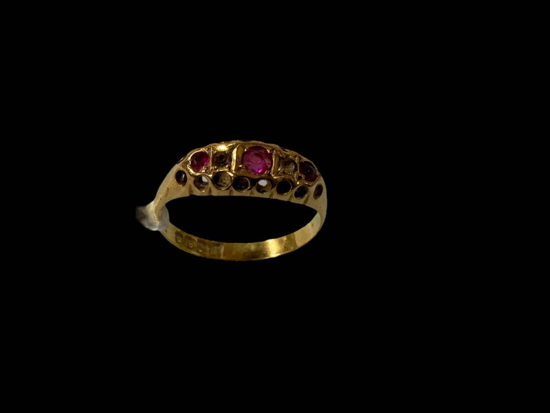 18 carat gold, ruby and gem set ring, size N.