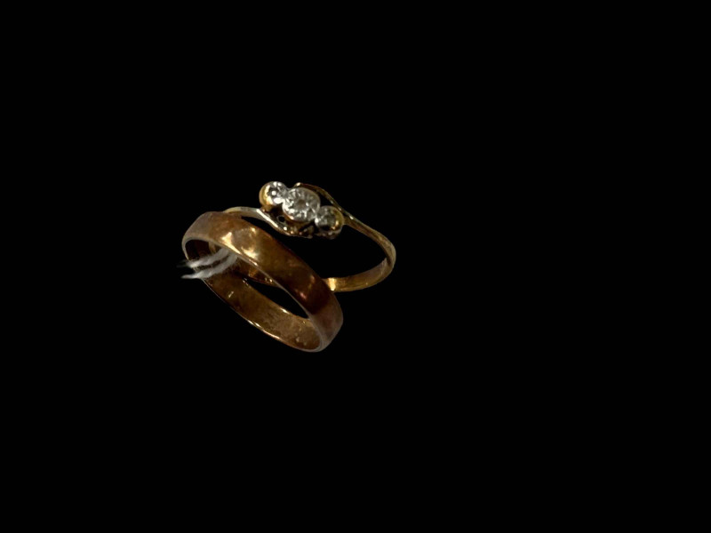 Two 9 carat gold rings,one gem set.