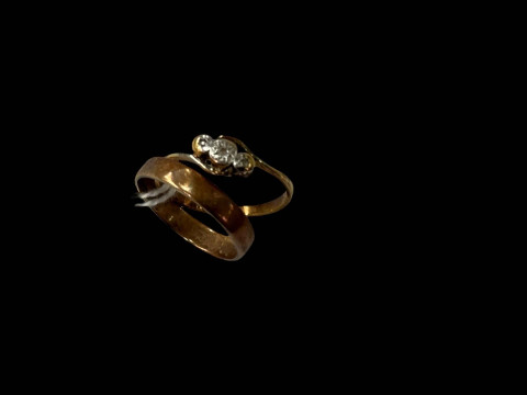 Two 9 carat gold rings,one gem set.
