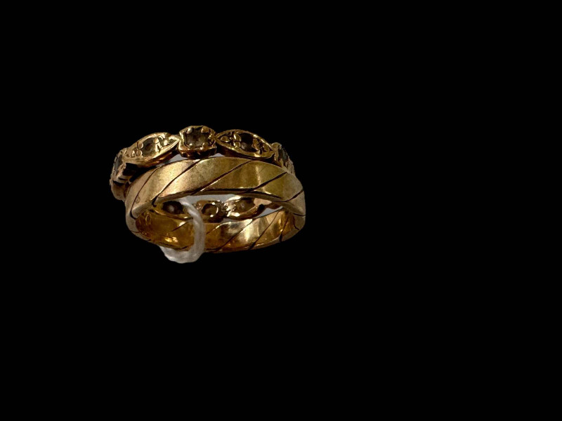 9 carat gold wedding band and 9 carat gold eternity ring (2).