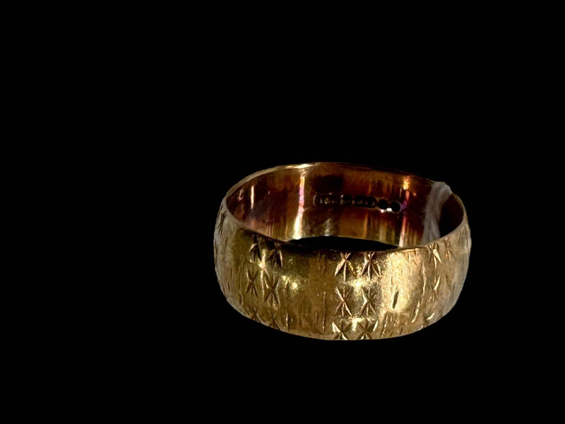 9 carat gold wedding band.