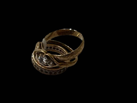 Three 9 carat gold rings, two gem set.