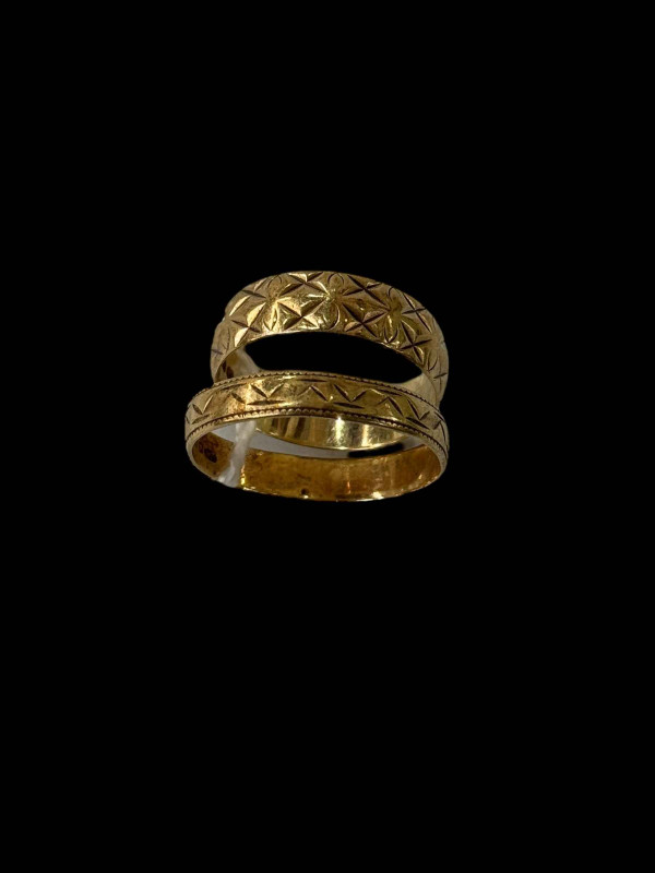 Two 9 carat gold band rings.