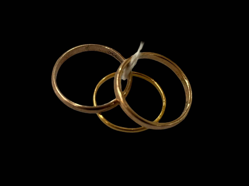 Two 9 carat gold band rings and third marked 14 (3).