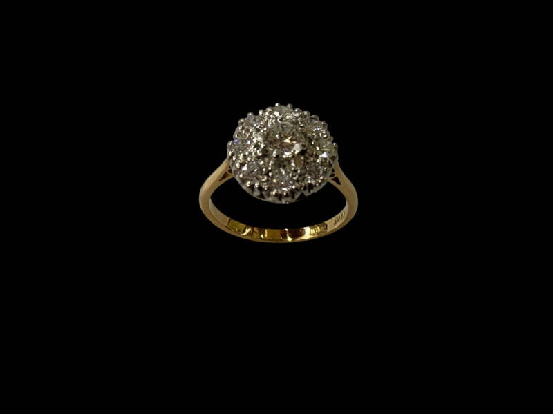 Diamond nine stone cluster 18 carat gold ring, centre stone approximately 0.5 carat, total over 1 carat, size N/O.