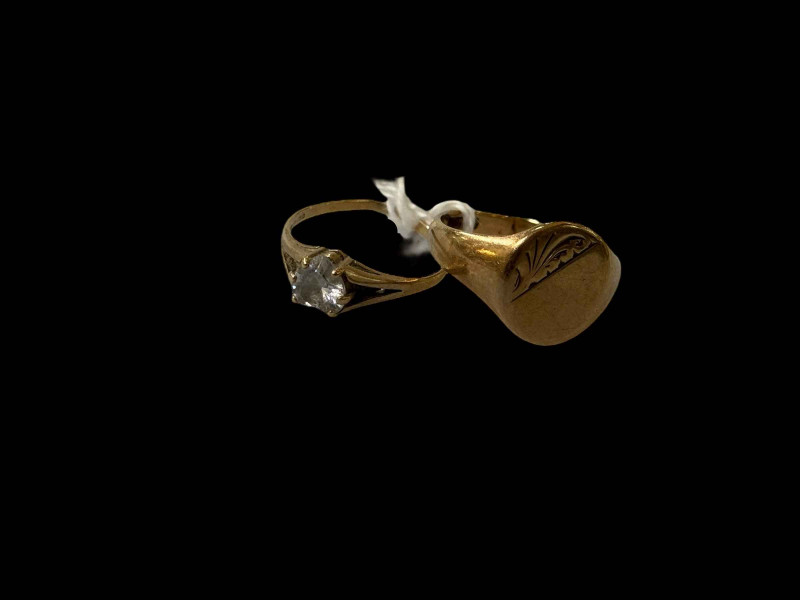 Two 9 carat gold rings, one with heart shaped stone.