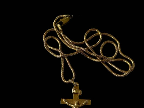 9 carat gold crucifix with chain (clasp not gold).
