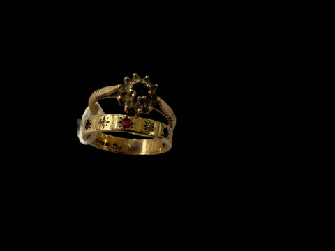 Two 9 carat gold gem set rings, stones missing.