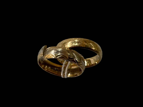 Two 9 carat gold wedding bands, one cut.
