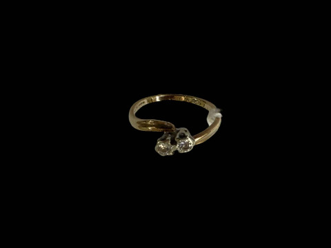 Diamond two stone 9 carat gold ring, size K.