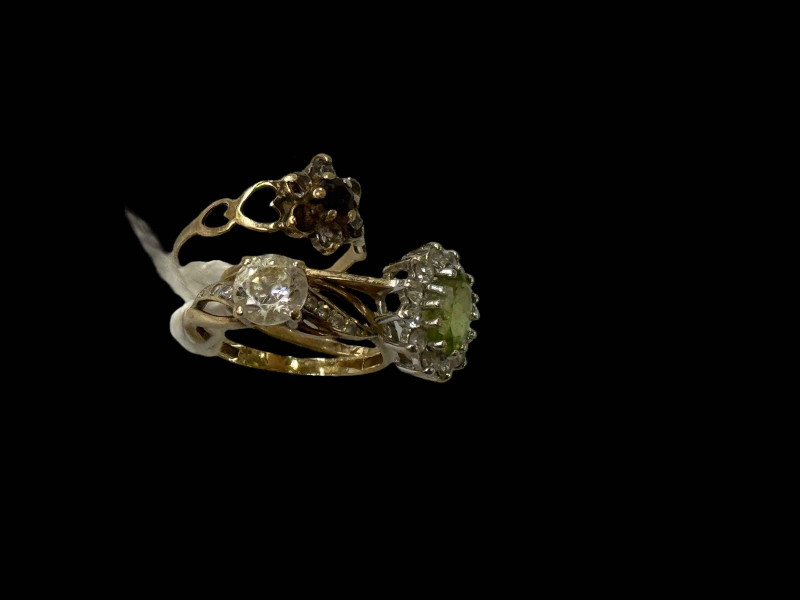 Three gem set 9 carat gold rings.