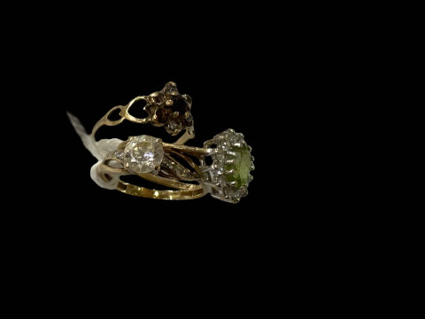Three gem set 9 carat gold rings.