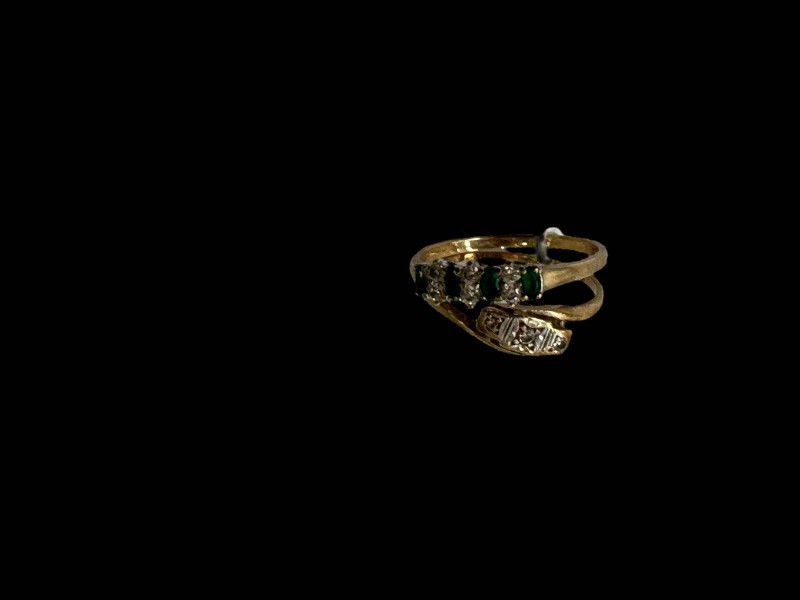 Two 9 carat gold gem set rings.