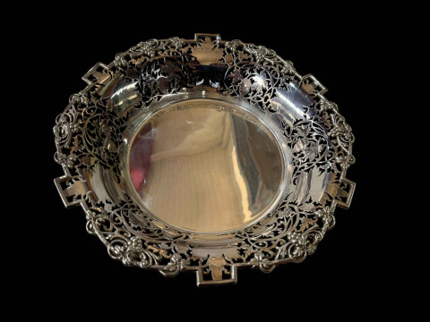 Walker & Hall silver fruit bowl having pierced vine decoration on three...