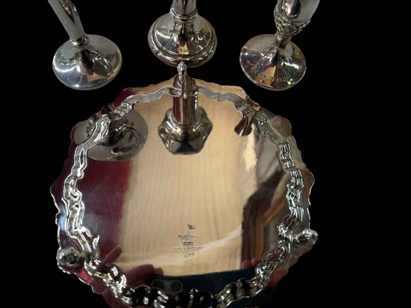 Two silver spill vases, Birmingham 1973 and Sheffield 1961, together with Walker & Hall salver, and spill.