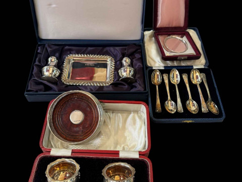 Cased silver salts, teaspoon, coaster, salt and pepper, small photo frame...